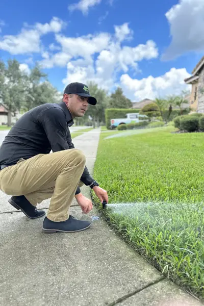 sorko irrigation technician testing out new system after sprinkler installation in central florida