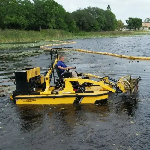 Workers digging out debris in pond - Irrigation Specialist Sorko Services in Pest Control & Exterminators | Pond and Lake Management Experts Sorko Services in Sanford, FL